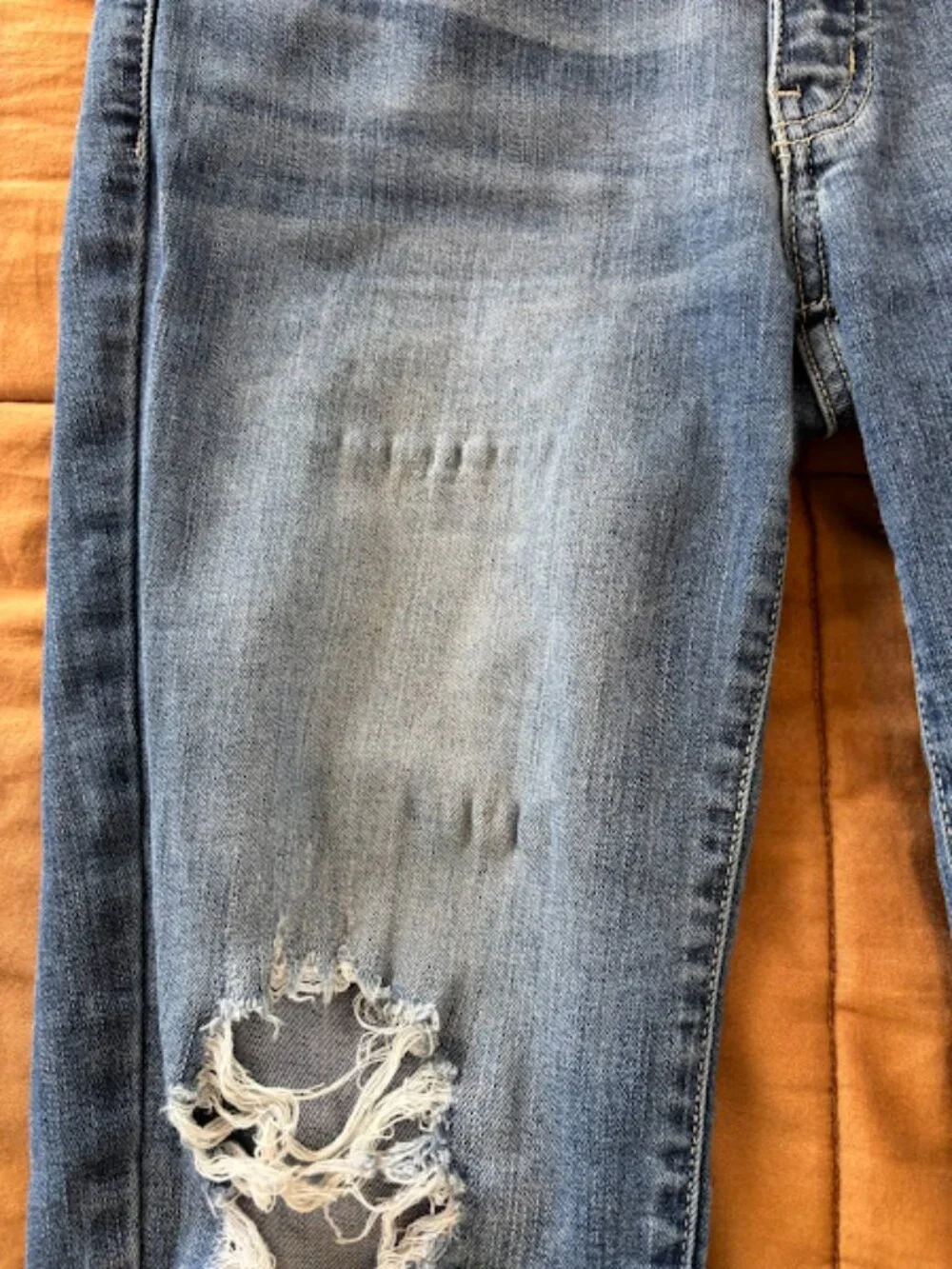 kancan distressed skinny jeans with raw hem